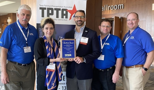 Group of UTA staff accepting the TPTA Program of the Year award.